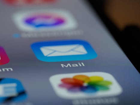 pexels-photo-7568298-7568298 Detailed close-up of an email app icon on a smartphone screen, showcasing modern technology.